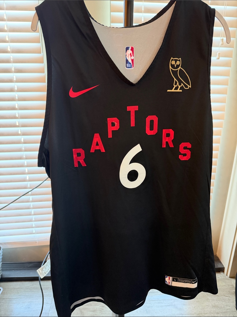Nike Black Raptors OVO Basketball Jersey with Red Accents